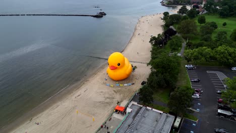 An-aerial-view-of-the-worlds-largest-rubber-duck-on-Rye-Beach-in-Rye,-New-York