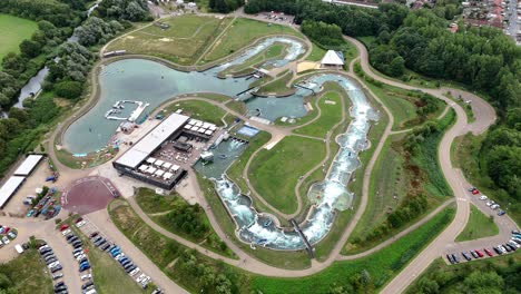 Aerial-view-looking-down-over-Lee-valley-white-water-training-centre-park-scenery,-London,-England