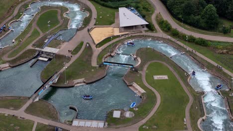 Lee-valley-white-water-centre-aerial-view-over-winding-family-rafting-course,-London