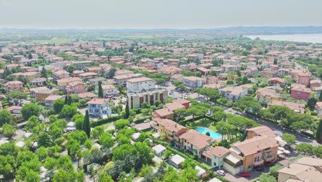 Red-brick-elite-villa-housing-at-Lido-Galeazzi-Sirmione-Italy-aerial