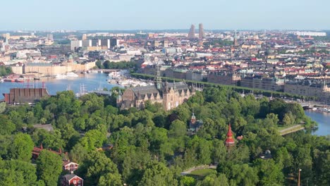 Stockholm-cityscape-and-Strandvagen-Street-over-Skansen-and-Museum-buildings,-sunny-day-in-Sweden