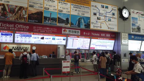 Japanese-People-Buy-Travel-Ticket-at-Nankai-Train-Shop-Osaka-KIX-Airport-Railway