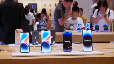 The-various-sample-phones-of-iPhone-14-series-are-shown-in-an-Apple-store-ICONSIAM-in-Bangkok,-Thailand