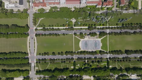Birds-eye-drone-shot-over-the-Midway-Plaisance-Park-and-the-University-of-Chicago,-USA