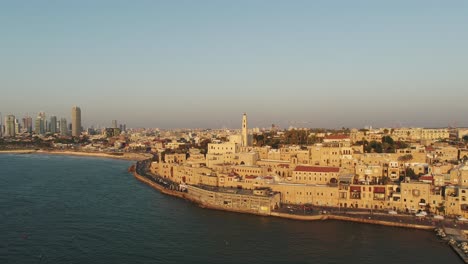 Aerial-view-of-Tel-Aviv-coastline-on-a-beautiful-day-over-The-Mediterranean-Sea