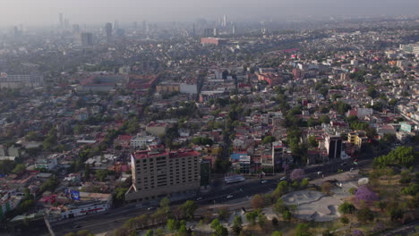 Aerial-birds-eye-view-Chapultepec-district-in-Mexico-city-with-buildings-and-cars-in-traffic-in-residential-area