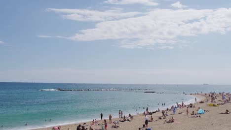 Barceloneta-Beach-Skyline-at-End-of-September-Pan-Right-4k-30fps