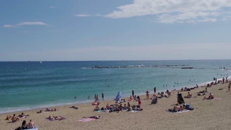 Barceloneta-Beach-Skyline-at-End-of-September-Pan-Right-4k-30fps