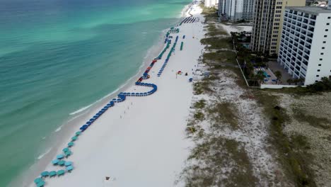 Aerial-view-of-Henderson-Beach-state-park,-Destin,-Florida,-United-States-and-coastline-with-colorful-cloud-and-blue-sky