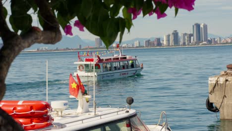 A-yacht-heading-into-the-Da-Nang-city-from-Son-Tra-Marina,-Da-Nang-City,-Viet-Nam