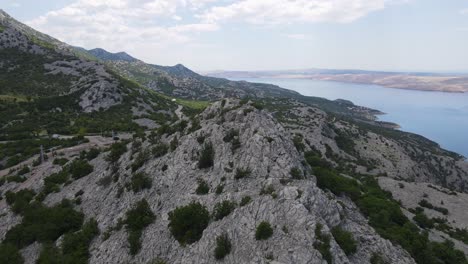 Aerial-backward-Moonlike-Pag-Island-In-The-Adriatic-Sea,-Croatia
