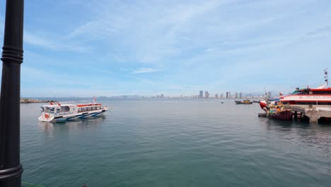 A-yacht-is-docked-in-the-seaport-at-Son-Tra-Marina,-Da-Nang-City,-Viet-Nam