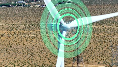 Holographic-graphics-on-wind-powered-turbine,-aerial-of-3D-overlay-of-renewable-energy