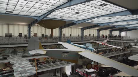 a-historic-airplanes-exhibition-in-National-Technical-Museum-in-Prague,-Czech-Republic,-showcasing-a-diverse-array-of-airplanes-from-different-eras