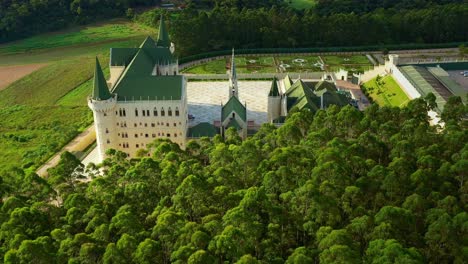 Drone-revealing-huge-school-yard-at-beautiful-religious-retreat-center