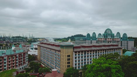 In-the-background-can-be-seen-the-Crockford-Tower-and-Hotel-Michael-in-the-Universal-Studio-theme-park-located-within-Resorts-World-Sentosa-on-Sentosa-Island,-Singapore