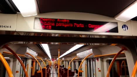 Close-up-of-train-information-board-showing-destination-to-Aveiro