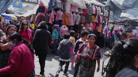 Locals,-tourists-crowd-vibrant-street-market,-Quetzaltenango-Guatemala