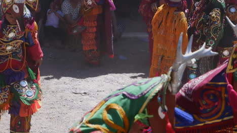 Indigenous-entertainers-dance-in-costume-for-audience-in-Antigua,-GTM