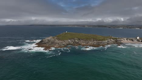 Aerial-shot-of-waves-crashing-against-the-Towan-Headland-in-Newquay