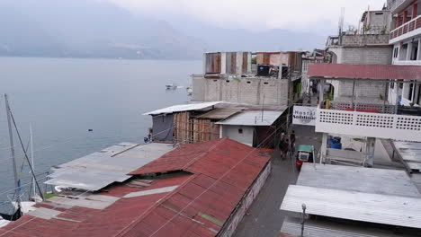 People-and-tuk-tuks-on-Lake-Atitlan-waterfront-from-Sublime-Hostel