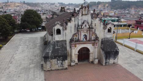 Dramatic-San-Jacinto-Chapel-façade-is-hundreds-of-years-old,-aerial