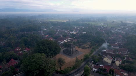 Aerial-view-of-Mendut-Temple-in-foggy-morning