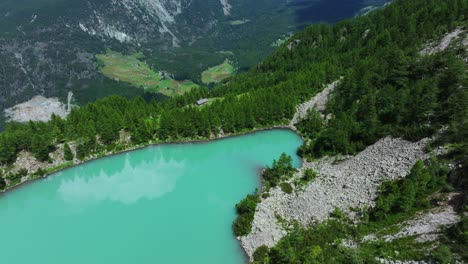 Birdseye-view-of-Lake-Lagazzuolo-in-Valmalenco-valley-of-Valtellina-in-summer-season-in-Italy