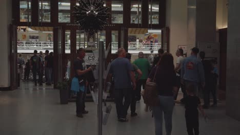 People-at-entrance-to-the-National-Technical-Museum-in-Prague,-Czech-Republic