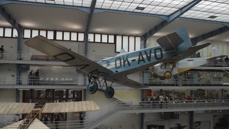 a-historical-aircraft-exhibition-in-National-Technical-Museum-in-Prague,-Czech-Republic,-showcasing-a-diverse-array-of-airplanes-from-different-eras