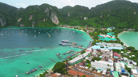 Beautiful-bay-scene-of-Ko-Phi-Phi-Islands,-boats-in-marina,-Thailand