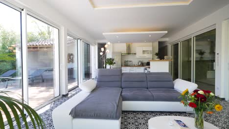 Slow-dolly-shot-showing-a-modern-living-room-within-a-villa-in-Nimes