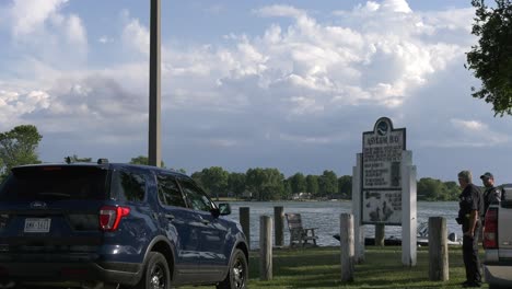 plane-flying-over-lake-front