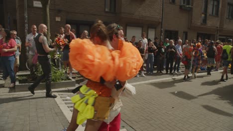 Woman-and-man-dancing-during-the-Antwerp-Pride-Parade-2023-in-Belgium