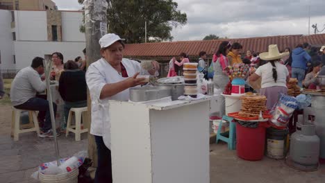 Street-Scene-With-Food-Vendors-Selling-Variety-Of-Local-Dishes-In-Cajamarca,-Peru