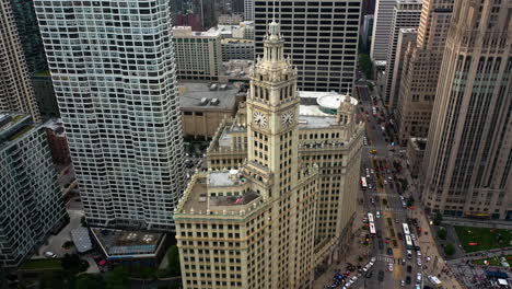 Aerial-view-around-the-Wrigley-building-clock-tower-in-downtown-Chicago,-USA