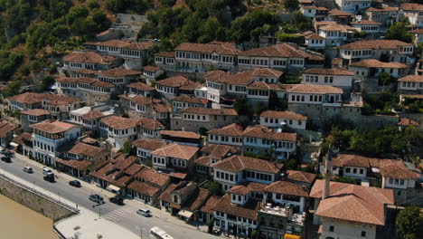 Berat-Albania,-aerial-views-of-the-urban-landscape:-aerial-view-in-orbit-to-the-famous-houses-with-their-houses-and-their-windows