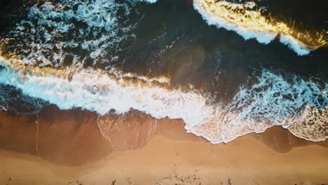 Aerial-Shot-of-the-Baltic-Sea-Costline-With-Waves-View-From-Above
