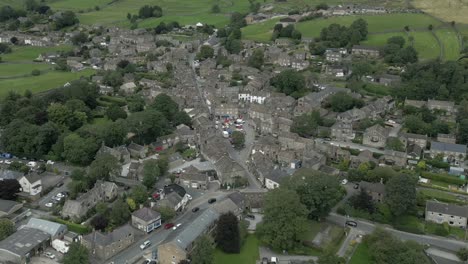 An-aerial-view-of-the-Yorkshire-town-of-Grassington-on-a-cloudy-summer-afternoon,-England,-UK