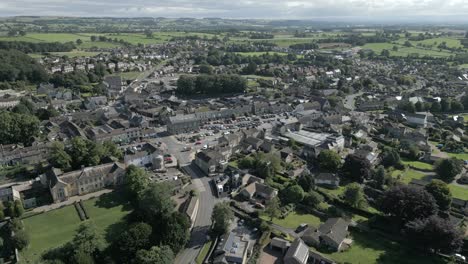 An-aerial-view-of-the-Yorkshire-town-of-Leyburn-on-a-sunny-summer-morning,-England,-UK
