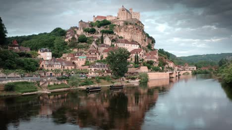 Slow-Cinematic-Camera-Flight-To-Beynac-Castle-In-Dordogne---Aerial-France