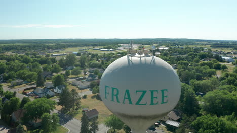 Daytime-Aerial-of-Frazee-Water-Tower-with-"Frazee"-Printed-in-Frazee,-Minnesota