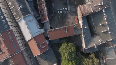 Aerial-Drone-Shot-of-Podgorze-historical-Jewish-Ghetto-neighborhood-of-Krakow-Poland-with-the-river-Vistula-at-Sunrise