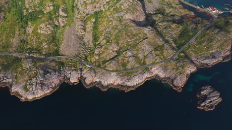 Downward-angle-drone-footage-of-coastline-Festvågtind,-Lofoten-Islands,-Norway