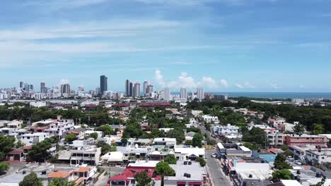 drone-view-from-high-above-houses-in-the-residential-area-in-santo-domingo,-beautiful-sunny-day