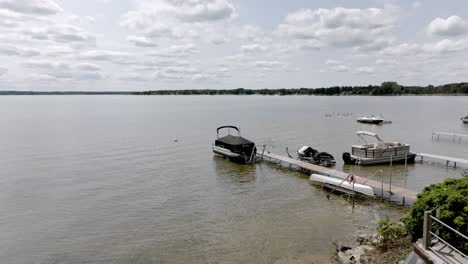 Lake-Missaukee-in-Lake-City,-Michigan-downtown-with-drone-video-moving-forward-and-low