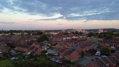 Warrington-in-United-Kingdom-by-drone,-aerial-footage-4K-at-sunset