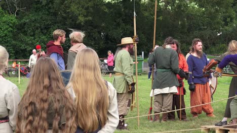 Viking-re-enactment-maidens-look-on-as-men-do-battle-at-Woodstown-Waterford-Ireland
