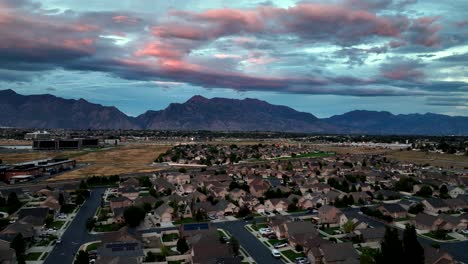 Suburban,-valley-community-at-sunset---aerial-panorama