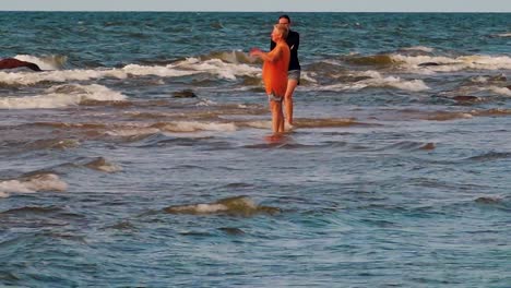 Women-walked-on-the-waves-of-the-sea